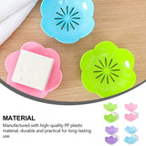 Self-draining soap dish with flower design for effective soap storage in the bathroom.