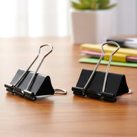 Lifestyle view of 25mm Black Binder Clips (12 Pc) - Office Products in use