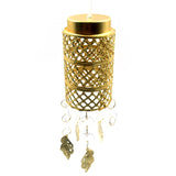 Decorative golden jhoomer with ornate design.