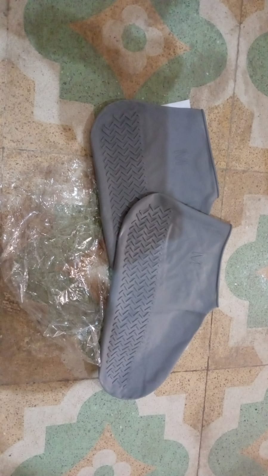 Close-up of anti-slip waterproof shoe covers