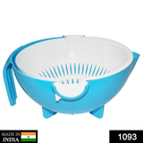 Bowl with integrated strainer for washing produce, featuring a handle.