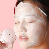 Silicone face scrubber in cute octopus shape, ideal for facial cleansing.