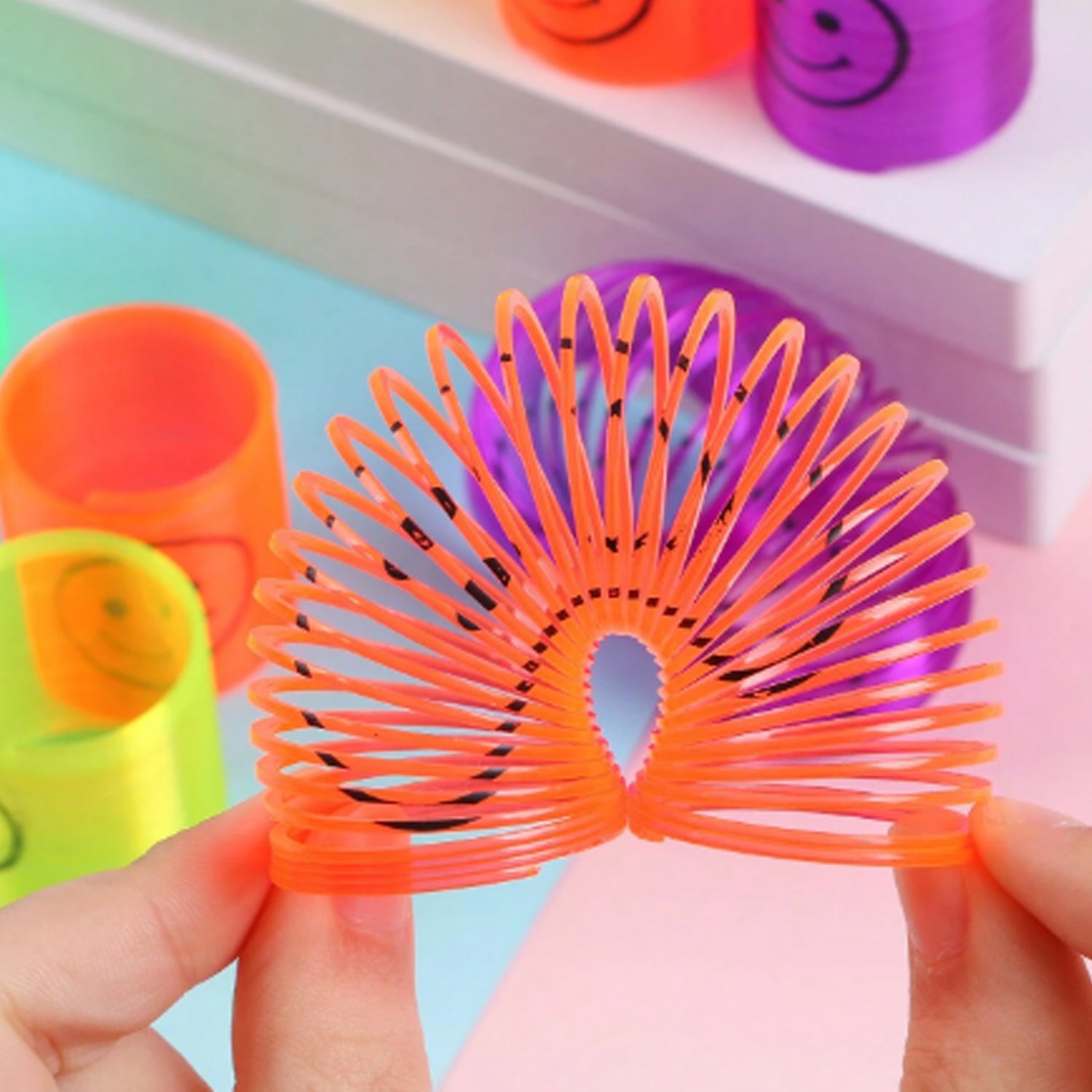 Multicolor Magic Smiley Spring Spring Toys Slinky Slinky Spring Toy Toy For Kids For Birthdays Compact And Portable Easy To Carry (12 Pcs Set) - LootFaat