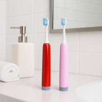 Battery-Operated Electric Toothbrush with Replaceable Soft Head