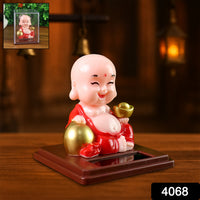 Solar Power Moving Head Buddha Statue Car Ornament (1 Pc  Mix Color)