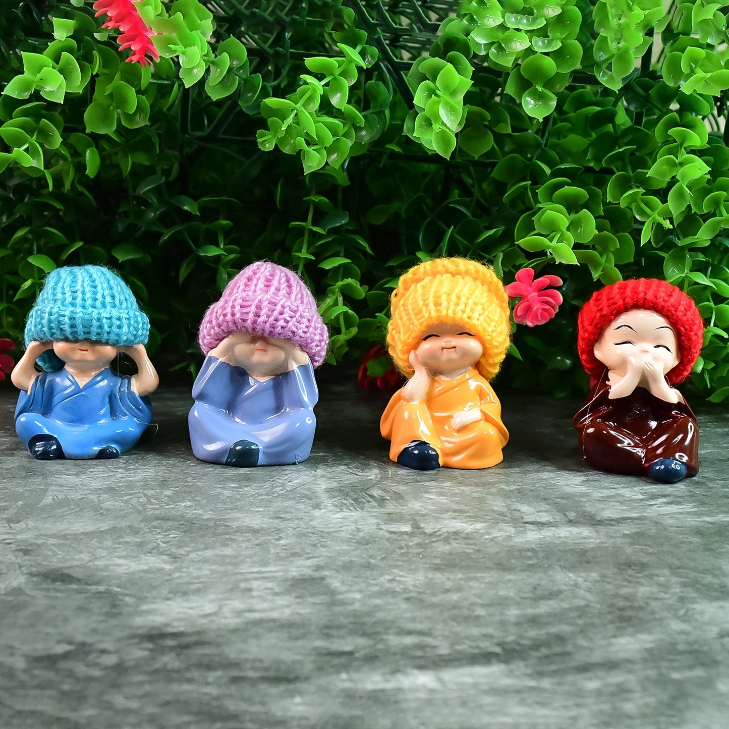 Decorative Resin Monk Buddha Showpiece Set Of 4 With Traditional Straw Hats