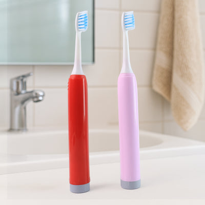 Battery-Operated Electric Toothbrush with Replaceable Soft Head