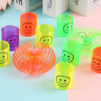 Multicolor Magic Smiley Spring Spring Toys Slinky Slinky Spring Toy Toy For Kids For Birthdays Compact And Portable Easy To Carry (12 Pcs Set) - LootFaat