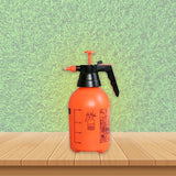 Garden sprayer with hand pump